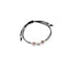 Bracciale Dadini bimba e bimba oro e argento cordino nero